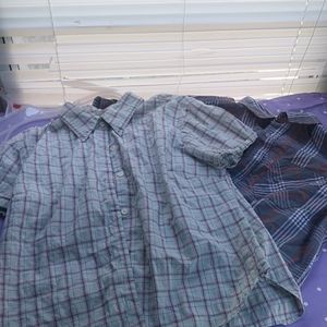 2 button up boys shirts